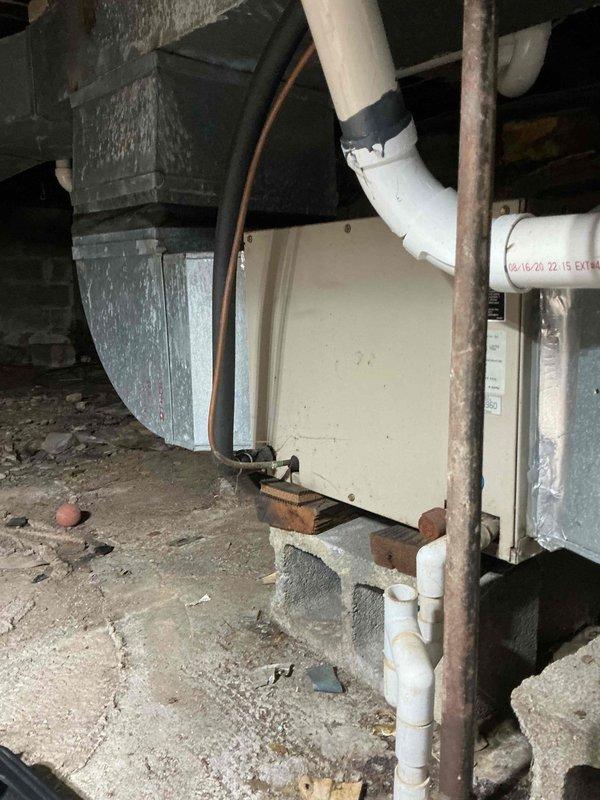Responded to no-heat/no-cool call for HVAC system located in crawl space. Performed diagnostic evaluation on 6-year-old furnace and 15+ year-old air conditioning unit that were both completely non-operational. Inspected electrical connections, thermostat communication, gas supply lines, and control boards to identify root cause of system failure and provided recommendations for repair.