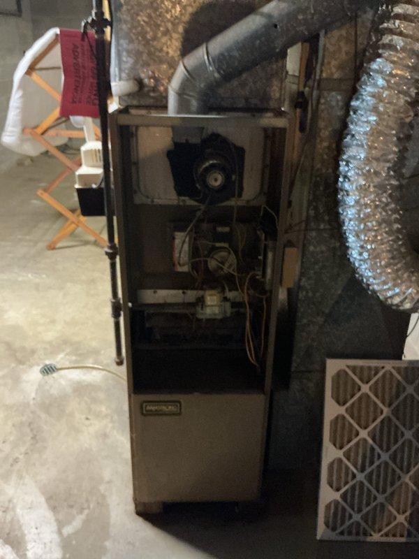 Responded to service call for non-working furnace in 30-year-old residential property. Upon inspection, found older model gas furnace with burner failure. Performed combustion analysis testing which revealed elevated carbon monoxide levels at 142 ppm, oxygen reading of 7.4%, and combustion efficiency of 82.6%. Due to age of equipment, safety concerns with CO levels, and failed burner assembly, recommended system replacement rather than repair of original components.