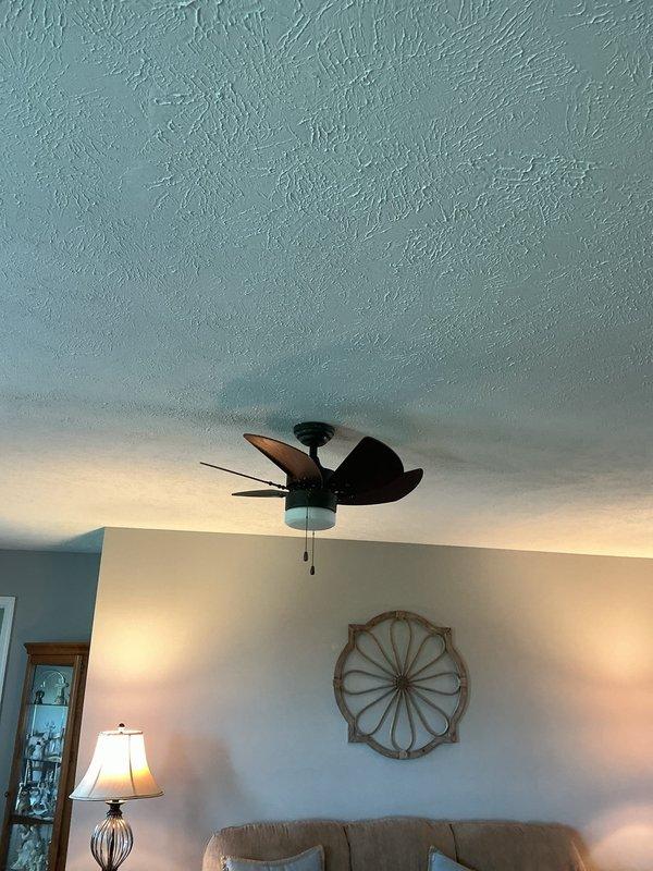 Completed installation of five new light fixtures throughout the residence, including a flush-mount ceiling fixture and a ceiling fan with integrated light kit. Additionally, relocated an existing ceiling fan to a new position, replaced the front porch light fixture, and installed a new light fixture in the utility room to improve illumination in the workspace.