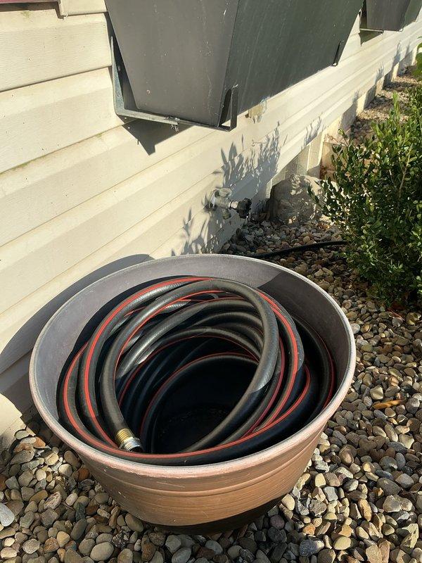 Responded to service call for reported outdoor hose leak. Upon arrival, inspected exterior hose bib and associated garden hose assembly stored in container near HVAC unit on side of residence. Examined hose connections, fittings, and outdoor spigot for signs of leakage or damage. Verified system integrity and provided assessment of outdoor plumbing fixtures.