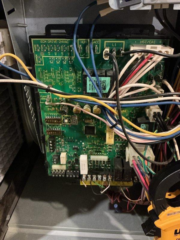 Completed annual heating maintenance and tune-up on residential gas furnace system. Performed comprehensive inspection of furnace cabinet, blower assembly, and control board components including ECN DRIVE-24VAC module with all electrical connections verified secure. All system components including humidifier, ductwork, and exhaust venting inspected and found operating within normal parameters with no deficiencies noted.