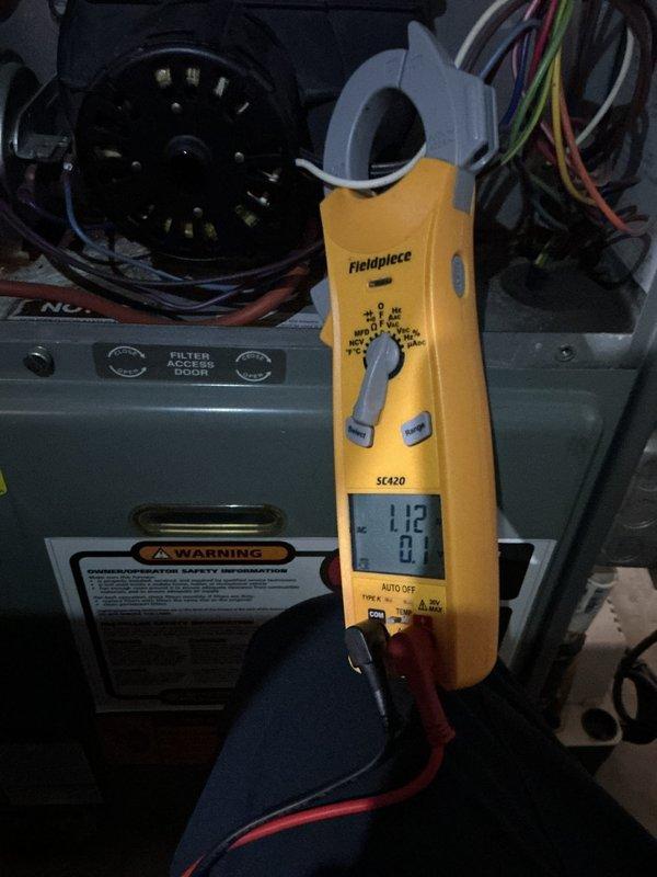 Completed comprehensive tune-up on 20-year-old furnace unit, including full system inspection, electrical testing with clamp meter showing 1.12 amp draw, blower motor assembly evaluation, and filter access verification. All components operating within normal parameters at time of service completion.
