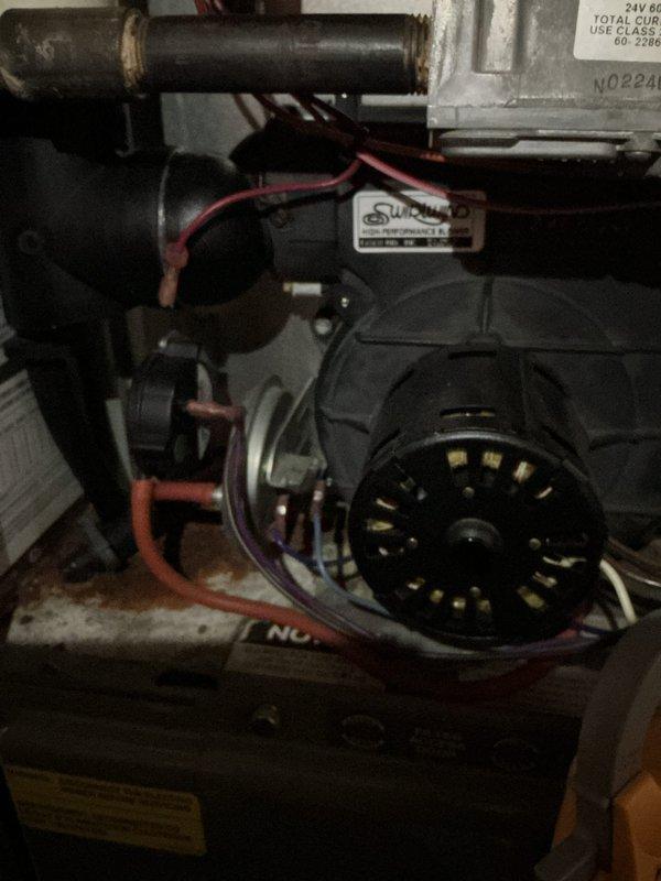 Completed comprehensive tune-up on 20-year-old furnace unit, including full system inspection, electrical testing with clamp meter showing 1.12 amp draw, blower motor assembly evaluation, and filter access verification. All components operating within normal parameters at time of service completion.