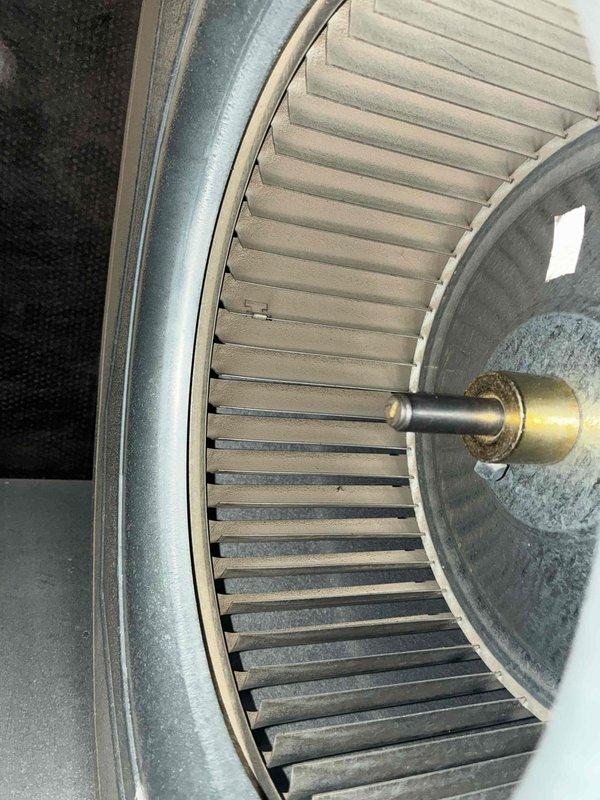 Performed scheduled heating maintenance on a 5-year-old system. Removed and inspected blower wheel assembly, which showed dust and dirt accumulation on blades. Cleaned blower components and verified proper operation before reassembly.