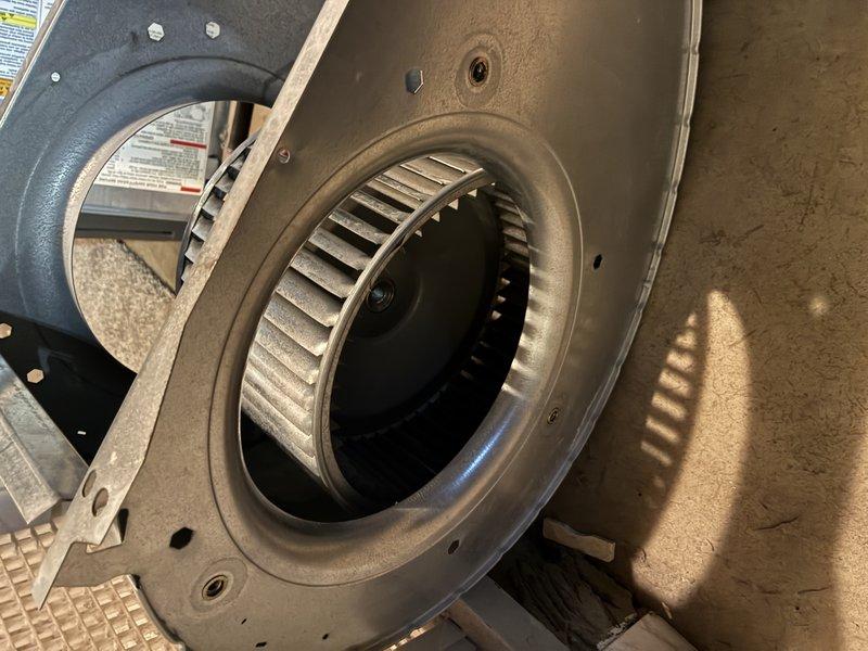 Performed comprehensive HVAC maintenance including thorough cleaning of the squirrel cage blower wheel to remove accumulated dust and debris, cleaned the indoor evaporator coil, and completed full heating system maintenance. No parts replacement was required to restore the system to optimal operating condition.