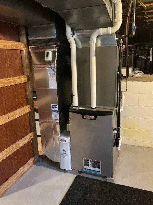 Completed comprehensive MVP maintenance service on both heating and cooling systems at residential property. Performed full inspection and preventative maintenance on Lennox furnace unit located in basement mechanical room and exterior Lennox condenser unit. Conducted standard heating season checks including burner inspection, heat exchanger examination, airflow verification, and safety control testing on furnace. On cooling system, performed condenser coil cleaning, refrigerant line inspection, electrical connection verification, and operational testing. Installed previously quoted surge protector devices to protect HVAC equipment from electrical damage. All systems tested and operating within manufacturer specifications upon completion.