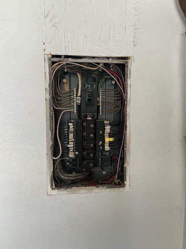 Installed two new dedicated 120V circuits for exterior holiday decoration outlets. First circuit was run from the basement subpanel to a new weatherproof receptacle mounted near the front of the home at foundation level. Second circuit was installed from the main electrical panel to a new exterior outlet positioned just inside the fence line near the garage area. Both circuits were wired with appropriate gauge copper conductors, protected with GFCI breakers, and terminated in weather-resistant outlet boxes with in-use covers mounted on the exterior brick foundation. All work completed to current NEC standards for outdoor receptacle installations.