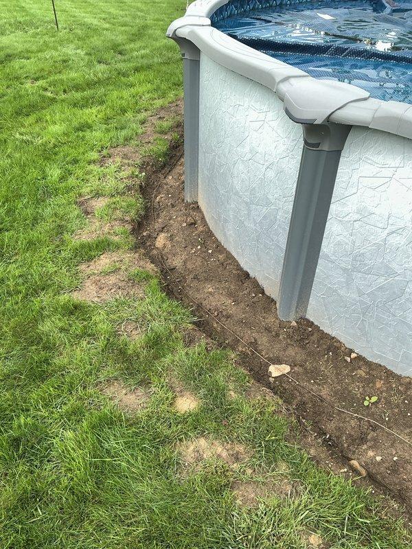 Excavated and cleaned trench around above-ground pool perimeter in preparation for electrical inspection. Documented all electrical connections with photographs showing exposed conduit and wiring installations. Coordinated with inspector onsite and completed backfill of trench following successful inspection approval.