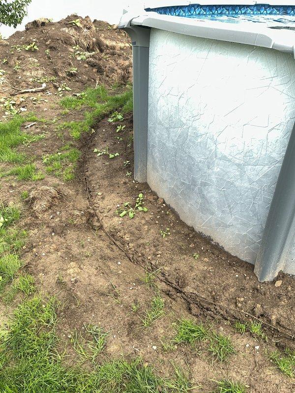 Excavated and cleaned trench around above-ground pool perimeter in preparation for electrical inspection. Documented all electrical connections with photographs showing exposed conduit and wiring installations. Coordinated with inspector onsite and completed backfill of trench following successful inspection approval.