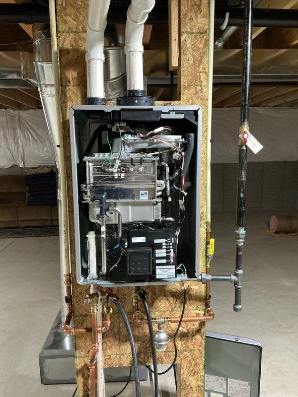 Performed annual maintenance and descaling service on tankless water heating unit. Isolated unit from water supply using installed service valves and connected descaling pump with circulation hoses to flush system. Circulated food-grade descaling solution through heat exchanger for recommended duration to remove mineral buildup and calcium deposits. Flushed system thoroughly with clean water to remove all descaling solution residue. Inspected internal components, heat exchanger condition, and verified proper operation of all connections. Reinstalled access panels and restored unit to normal operation. System tested and confirmed to be functioning within manufacturer specifications.