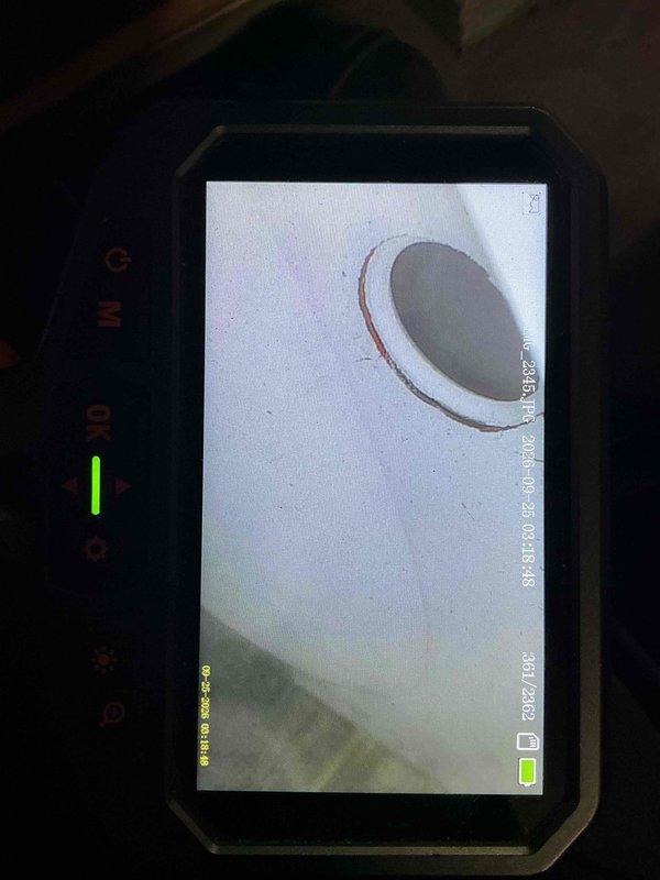 Responded to no heat call on gas furnace. Performed diagnostic inspection using borescope camera to examine heat exchanger for cracks or deterioration. Visual inspection revealed heat exchanger condition and internal combustion chamber components. Documented findings with thermal imaging equipment for service records.