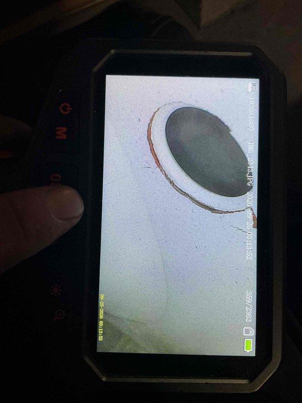 Responded to no heat call on gas furnace. Performed diagnostic inspection using borescope camera to examine heat exchanger for cracks or deterioration. Visual inspection revealed heat exchanger condition and internal combustion chamber components. Documented findings with thermal imaging equipment for service records.