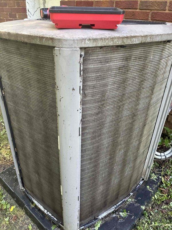 Completed comprehensive cooling maintenance on 2-year-old gas HVAC system. Inspected outdoor condenser unit, which showed significant dirt and debris accumulation on metal fins requiring attention. Evaluated electrical components including contactor, wiring connections, and outdoor disconnect panel, confirming all connections secure and operational despite visible weathering on enclosure exterior.