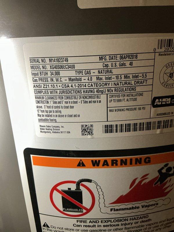 Responded to gas leak call in basement area. Upon inspection, located active gas leak in exposed piping system near water heater installation. Performed pressure test on gas lines to verify leak location and ensure system integrity. Documented existing conditions including 40-gallon natural gas water heater (34,000 BTU input) manufactured in 2018, along with surrounding copper plumbing infrastructure and structural components. Identified compromised connection points requiring immediate attention to restore safe operation of gas system.