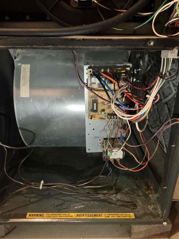 Performed comprehensive second opinion inspection on 18-year-old furnace system after another contractor diagnosed failed blower motor bearings, along with air conditioning contactor and capacitor issues. Conducted thorough visual and operational assessment of all furnace components including blower motor assembly, electrical connections, gas valve operation, and control board functionality. Upon detailed examination, found blower motor operating within normal parameters with no evidence of bearing failure, excessive noise, or vibration. All electrical connections secure and properly terminated, wiring harnesses intact with no signs of overheating or damage. Control board showing proper operation with all safety circuits functioning as designed. Gas valve assembly and burner components in satisfactory condition for age of unit. Documented system condition with detailed photographs of internal components, blower motor housing, electrical connections, and control systems. Provided homeow