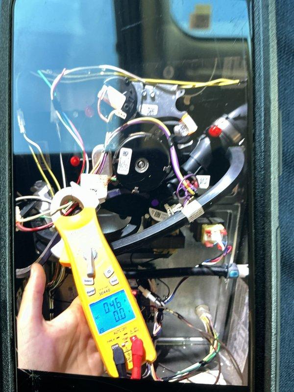 # No Heat Service Call - Gas Furnace

Responded to a no heat call for a 5-year-old gas furnace. Upon arrival, performed systematic diagnostic procedures to identify the cause of system failure.

Removed access panels and conducted visual inspection of all internal components, including blower motor assembly, electrical connections, and control wiring. Utilized digital multimeter to test voltage and continuity across key electrical components. Checked all wire harnesses and connector plugs for proper seating and signs of damage or corrosion.

Inspected blower motor, capacitor, and associated wiring for proper operation. Verified all safety switches and limit controls were functioning correctly. Examined control board connections and tested power supply to ensure proper voltage delivery to system components.

Traced all colored wire connections including yellow, red, white, and purple wires to verify proper circuit integrity. Checked all black hoses and tubing for proper connections and 