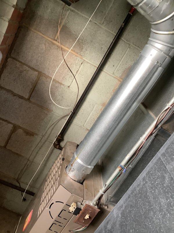 Completed air conditioning replacement estimate for residential property. Assessed existing HVAC system located in basement utility area, including evaluation of current ductwork configuration, electrical connections, and equipment placement. Discussed available replacement options and current promotional offerings with customer, who indicated interest in proceeding with installation in spring season.
