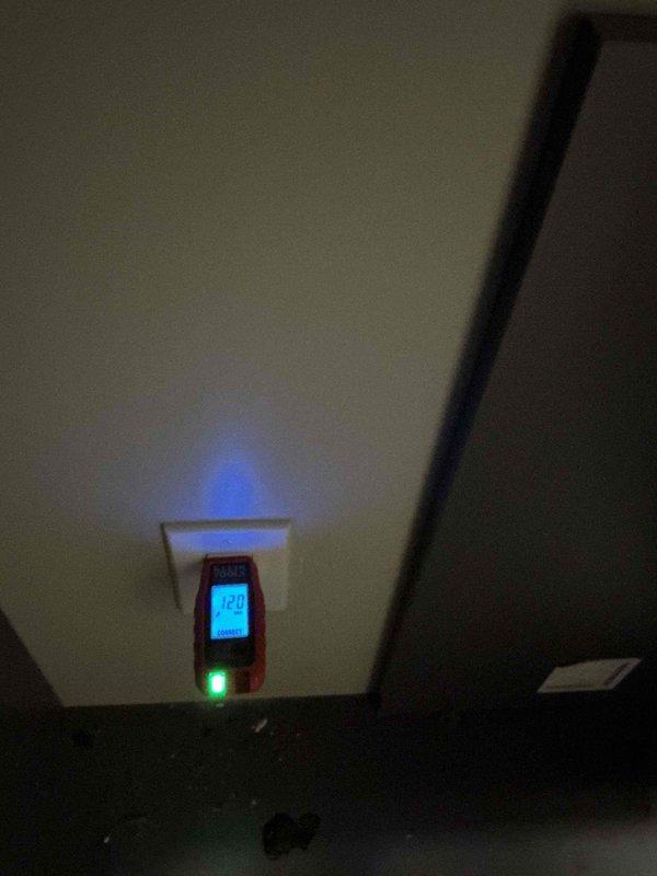 Responded to service call for non-functioning laundry room outlet and overhead light that had stopped working days apart. Accessed attic space through ceiling panel to troubleshoot electrical circuit serving both fixtures. Verified 120V power supply at circuit origin and traced wiring to identify failure point in the electrical pathway affecting multiple fixtures on the same branch circuit. Restored power to both the counter outlet and overhead light fixture, resolving the electrical issue.