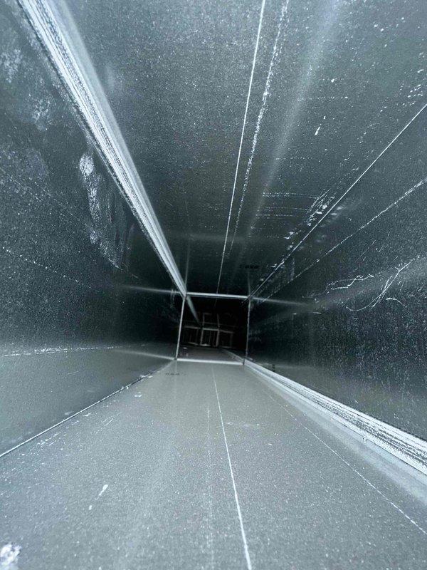 Completed comprehensive duct cleaning of residential HVAC system, accessing main trunk lines through access panels in finished basement area. Removed accumulated dust, debris, and particulate matter from interior ductwork surfaces, including metal seams, joints, and all accessible sections of the ventilation system. Installed customer-supplied Perfectpro 2025 air cleaner to improve overall air quality and system filtration efficiency.