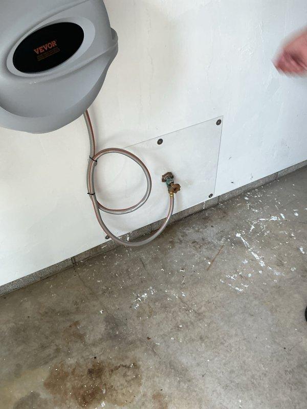 Serviced two 30-year-old frost-free hose bibs that were soldered to copper piping. Performed repacking and installed new washers on both units to restore proper function and eliminate leaks. Accessed one hose bib with standard clearance while the second required maneuvering around existing plumbing infrastructure in a confined space near ceiling joists with exposed insulation. Both fixtures are now operating correctly with no drips or water seepage.