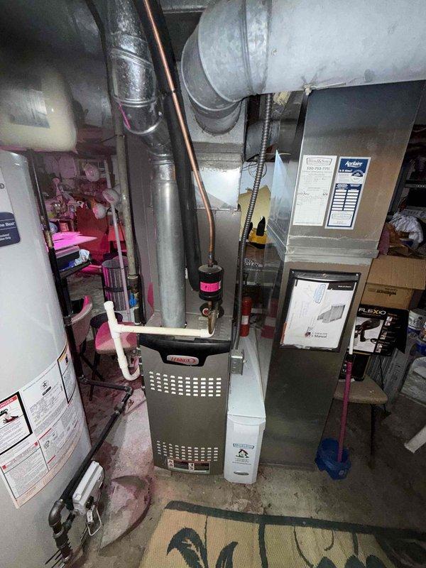 Completed MVP cooling maintenance visit on residential HVAC system. Performed comprehensive inspection of indoor air handler unit located in basement mechanical room and outdoor condensing unit positioned on exterior concrete pad. Verified proper operation of all cooling components, checked refrigerant lines and connections, inspected ductwork for leaks or damage, and confirmed system is functioning within manufacturer specifications for the upcoming cooling season.