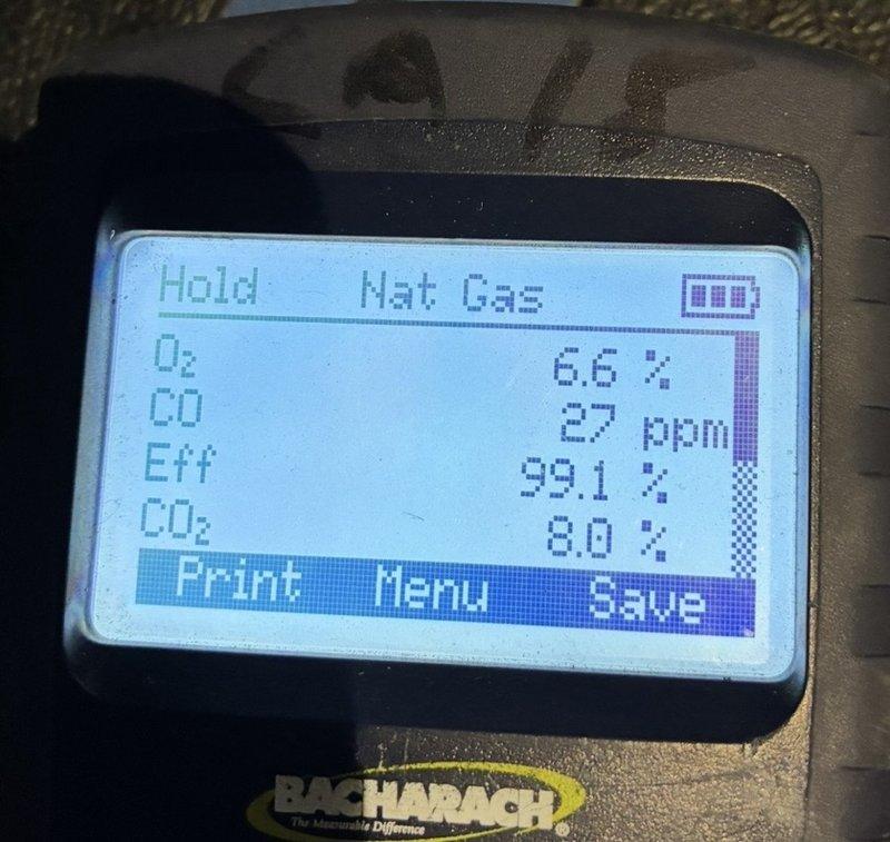 Performed maintenance and efficiency testing on 4-year-old MVP heating furnace system. Combustion analysis confirmed optimal performance with oxygen level at 6.6%, carbon monoxide at 27 ppm, efficiency at 99.1%, and carbon dioxide at 8.0%. Inspected blower wheel assembly and verified clean operation with no debris accumulation on blades or housing.