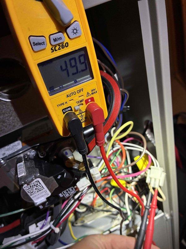 Completed MVP furnace maintenance including full system inspection and diagnostics. Verified control voltage readings at 49.9V and checked all low-voltage control wiring connections for proper operation. Inspected furnace components and confirmed system is operating within normal parameters.