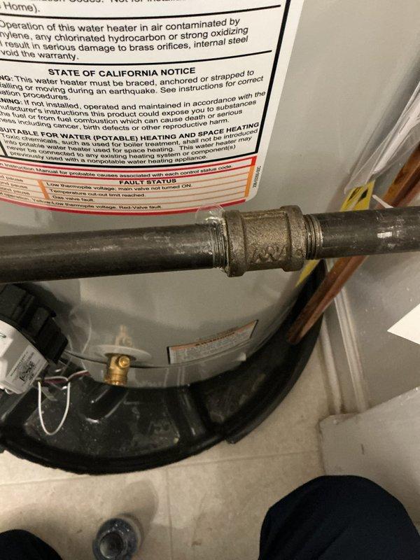 Responded to callback regarding gas leak at water heater installation from January. Upon arrival, inspected gas connector union fitting and confirmed minor leak at connection point. Tightened union fitting on gas line assembly to eliminate leak. Performed soap bubble test to verify gas-tight seal at all connections. Confirmed no additional leaks present in gas piping system and verified proper operation of water heater unit.