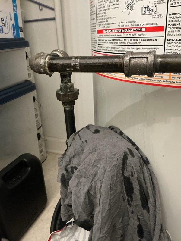 Responded to callback regarding gas leak at water heater installation from January. Upon arrival, inspected gas connector union fitting and confirmed minor leak at connection point. Tightened union fitting on gas line assembly to eliminate leak. Performed soap bubble test to verify gas-tight seal at all connections. Confirmed no additional leaks present in gas piping system and verified proper operation of water heater unit.