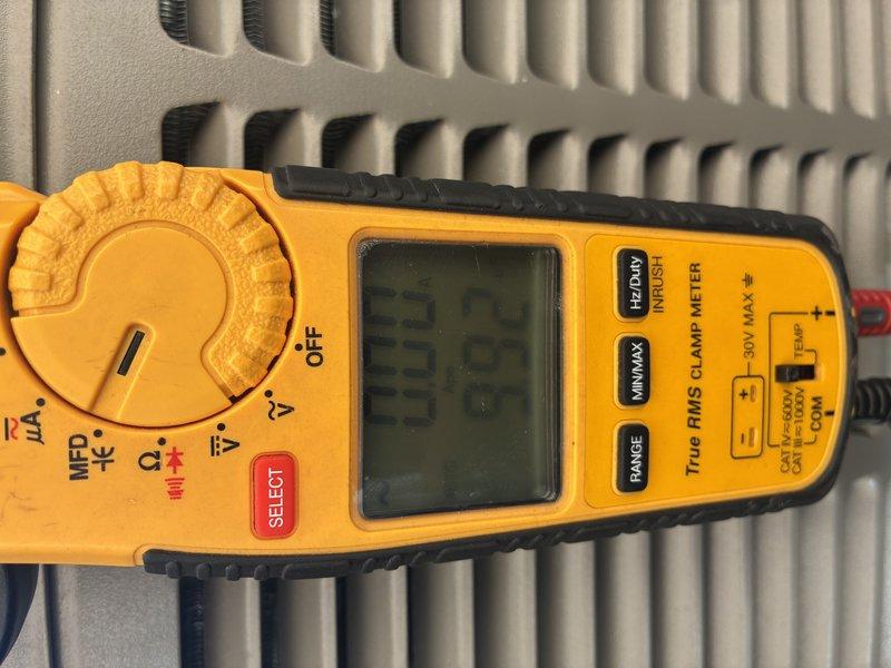 Completed annual precision tune-up on one-year-old furnace and air conditioning system. Performed comprehensive inspection of outdoor condensing unit, verified electrical connections and amperage readings using clamp meter, inspected and tested FLNR 50 amp fuses in disconnect box, checked refrigerant pressures, cleaned condenser coil, and evaluated overall system performance. All components found operating within manufacturer specifications with no issues identified during routine maintenance visit.