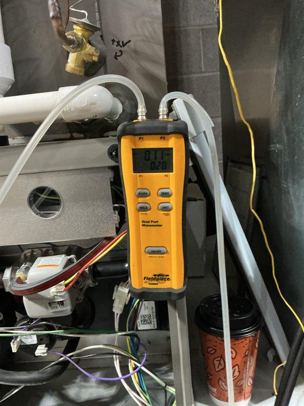 Completed MVP cooling maintenance visit on HVAC system. Performed system inspection, checked air filter condition and airflow, and measured static pressure readings using digital manometer which indicated 0.73 inches of water column. Verified proper operation of blower motor, inspected electrical connections and wiring, and confirmed condensate drainage system functioning correctly.