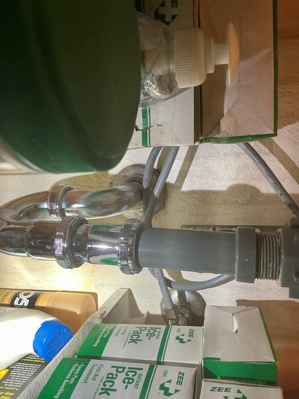 Responded to service call for bathroom sink pop-up drain assembly that was stuck in closed position and disconnected from lift rod mechanism. Upon inspection, found the pop-up stopper was inoperable due to disconnected pivot rod linkage beneath the sink. Disassembled the existing drain assembly, removed the faulty pop-up mechanism, and installed new pop-up drain assembly with proper pivot rod connection. Tested operation of lift rod and verified pop-up stopper now opens and closes smoothly, restoring full drain functionality to the bathroom sink.