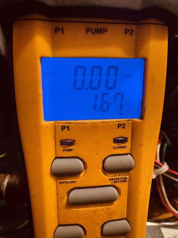 Responded to gas leak emergency on 5-year-old furnace where Columbia Gas had already shut down system for safety. Performed diagnostic testing using digital manometer to measure gas pressure at valve assembly, confirming burner bleeding issue. Inspected gas valve, control wiring connections, and copper supply line for potential failure points. Documented equipment condition with photos showing gas valve assembly, pressure readings, and wire connections to terminals. Furnace remains offline pending further repairs to address gas valve or control box malfunction causing the leak condition.