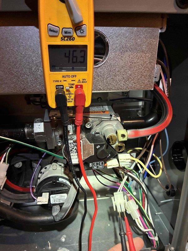 Completed annual pre-winter heating maintenance tune-up on a 1-year-old Lennox WT 09-2034 system. Performed comprehensive system diagnostics using digital multimeter to verify proper electrical readings at gas valve and control components, measuring 463 millivolts at the thermocouple connection. Inspected all wiring connections, pressure switches, and gas control mechanisms to ensure safe and efficient operation. System tested and confirmed to be functioning properly with no issues found.