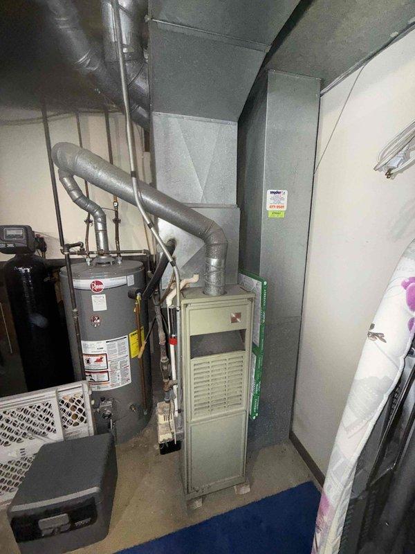 Performed comprehensive tune-up on 45-year-old gas furnace, including thorough cleaning of blower wheel assembly which showed significant dust and debris accumulation affecting airflow efficiency. Inspected all mechanical components, ductwork connections, and associated HVAC equipment to ensure proper system operation and safety compliance.