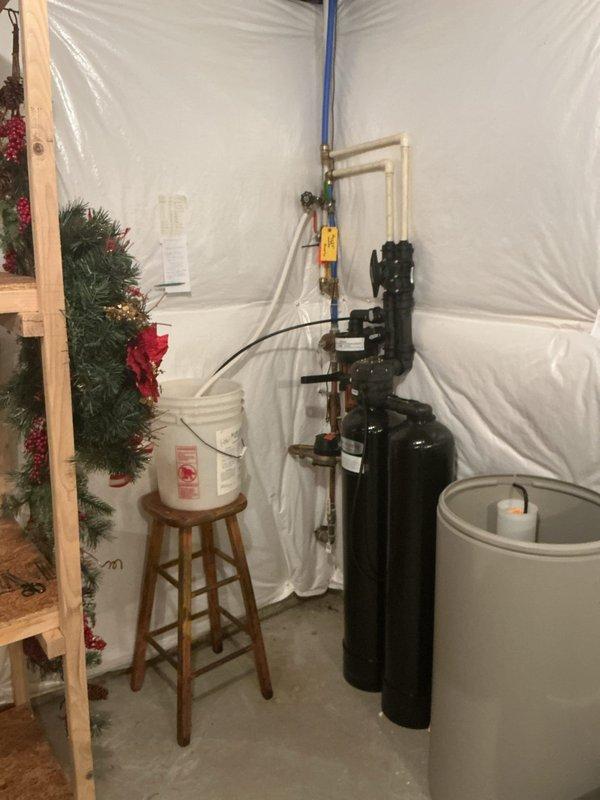 Performed routine maintenance flush on residential tanked water heater installed in 2022. Drained sediment buildup from tank bottom through drain valve, flushed system with fresh water until discharge ran clear, and refilled tank completely. Verified all plumbing connections, expansion tank, and pressure relief valve for proper operation. Inspected copper piping, PEX connections, and circulation pump for leaks or signs of wear. System restored to normal operation with no issues identified.