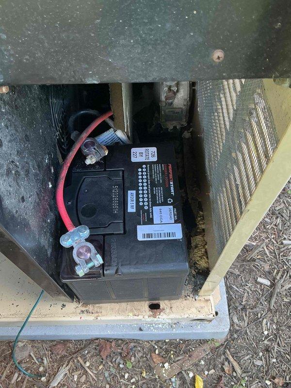 Responded to service call for standby generator failing to activate during power outages. Upon inspection, discovered failed battery preventing automatic transfer switch operation. Removed deteriorated battery from generator housing and replaced with new unit, reconnecting positive and negative cables to proper terminals. Verified all connections were secure and tested automatic start function to confirm generator now operates correctly during simulated power loss conditions.