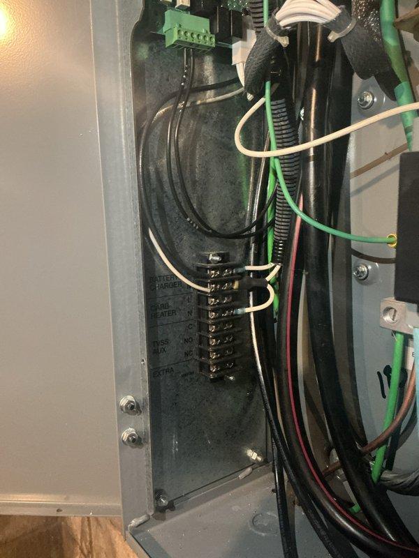 Replaced damaged printed circuit board (PCB) in transfer switch control panel due to corrosion and component failure. Removed existing corroded circuit board, installed new PCB, reconnected all electrical terminations, and verified proper operation of status indicators and control functions.