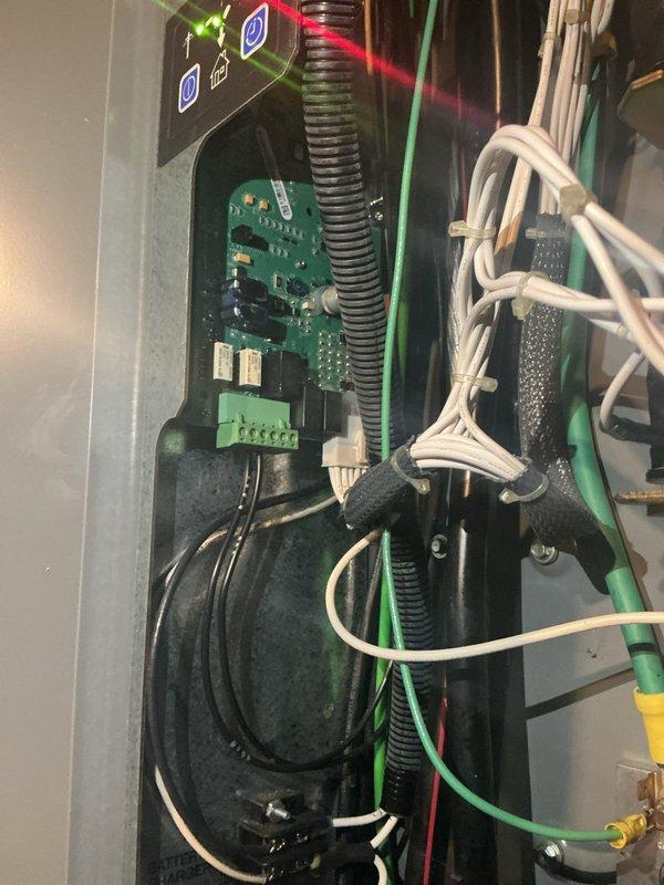 Replaced damaged printed circuit board (PCB) in transfer switch control panel due to corrosion and component failure. Removed existing corroded circuit board, installed new PCB, reconnected all electrical terminations, and verified proper operation of status indicators and control functions.