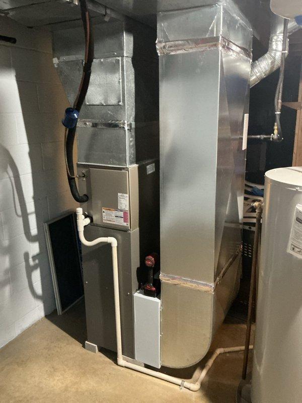 Performed comprehensive furnace tune-up and maintenance inspection on residential heating system. Unit operational with supply air temperature measured at 76.8°F. Inspected air handler, ductwork connections, and verified proper system operation with no deficiencies noted.
