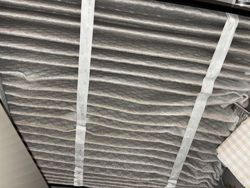 Completed scheduled MVP heating maintenance visit on residential HVAC system. Performed thorough inspection of heat exchanger components, examining multiple parallel metal fins and evaporator coils for proper condition and thermal transfer efficiency. All components showed normal wear patterns with no significant damage, corrosion, or excessive debris accumulation noted. System operational and functioning within normal parameters.