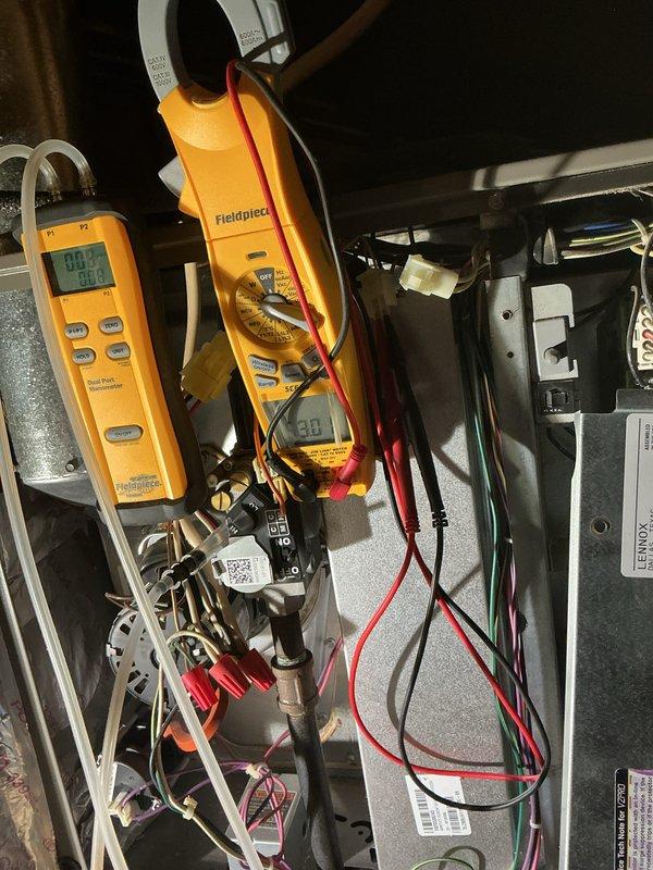 Completed annual preventative maintenance on 6-year-old furnace and air conditioning system. Performed comprehensive diagnostic testing on furnace including flame sensor inspection and electrical component verification, measuring current draw at 14 amps and temperature readings. Conducted AC tune-up on outdoor unit, inspecting capacitor, electrical connections, and system controls. All components tested within normal operating parameters with no issues identified or repairs required.