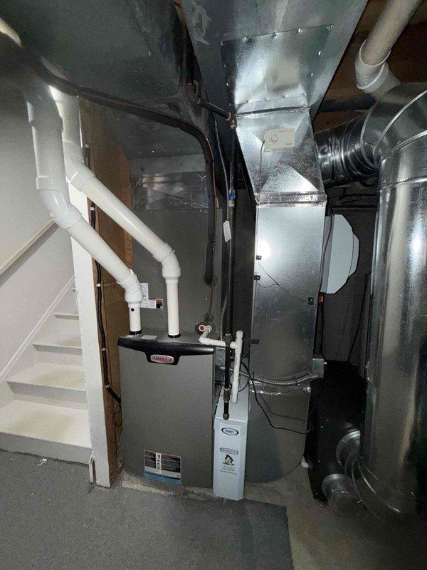 Completed preventive maintenance cooling service on 3-year-old electric furnace system with integrated cooling capabilities. Performed comprehensive inspection of HVAC equipment including furnace unit, ductwork connections, control board components, and all system connections. Verified proper operation of DIP switch settings on control board, checked all electrical connections and terminal blocks, and confirmed outdoor interchange jumper configurations were properly set. System tested and operating within normal parameters with no issues found or repairs required.