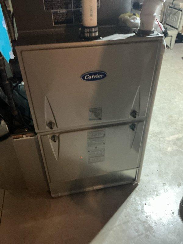 Performed comprehensive tune-up on 3-year-old Carrier gas furnace unit located in basement utility room. Conducted full system inspection, verified proper operation of all components, inspected and documented air filter condition, and confirmed unit is operating within manufacturer specifications for the heating season.