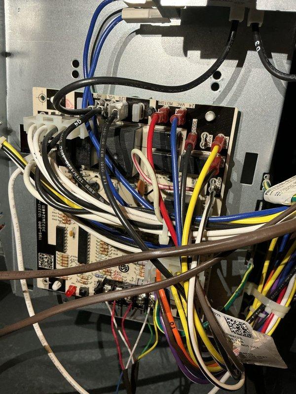 # Furnace Tune-Up Completed

Performed comprehensive preventive maintenance on a 3-year-old gas furnace. Conducted electrical diagnostics using digital multimeter to verify proper voltage and resistance readings across control board components, measuring 45 ohms on critical circuit paths. Inspected and tested all electrical connections, including control board relays, capacitors, and terminal blocks. Verified proper operation of all safety controls and confirmed secure wire routing throughout the equipment cabinet. All systems tested and operating within manufacturer specifications.