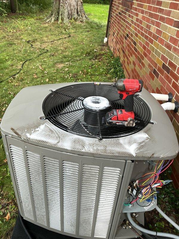 Completed MVP Cooling Visit on residential air conditioning system. Performed comprehensive inspection of outdoor condensing unit, verified proper operation of condenser fan assembly, and documented equipment condition with detailed photographs. Unit found operating within normal parameters with no immediate service requirements identified.
