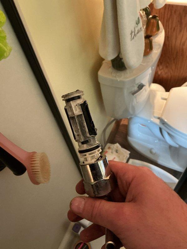 Responded to a shower temperature control issue where only hot water was being produced. Diagnosed a faulty shower valve cartridge and performed replacement of the defective component. Accessed the plumbing behind the wall, removed the old cartridge showing mineral buildup and worn seals, and installed a new cartridge to restore proper hot and cold water mixing functionality.