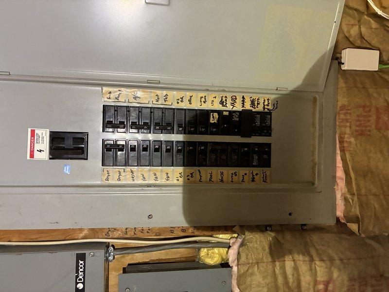 Replaced damaged breakers in the bottom right corner of the main electrical panel and installed a 20/30 amp tandem breaker in the same location. Verified panel compatibility for tandem breaker installation. Ran new wiring from the main panel to the existing disconnect, bypassed the disconnect unit, and reinstalled the cover with the breaker in the off position. Installed an additional tandem breaker in the bottom left corner of the panel to address safety concerns and ensure proper circuit protection throughout the system.