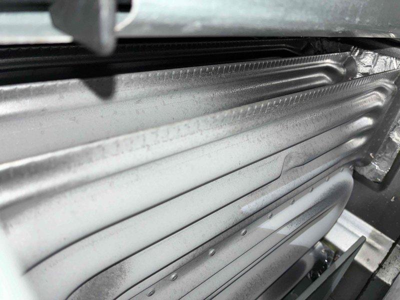 Completed comprehensive MVP heating maintenance inspection and documentation of evaporator coil assembly. Performed visual assessment of heat exchanger fins, which showed clean condition with proper spacing and no visible debris accumulation, and verified structural integrity of housing components and mounting hardware.