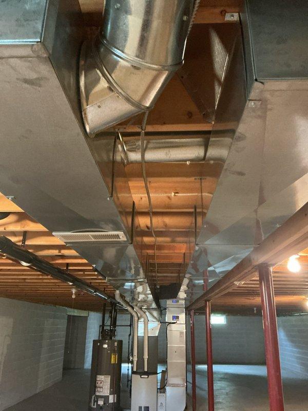 Installed dedicated electrical circuit with proper wiring and protection in basement mechanical room to support HVAC and water heating equipment. Circuit was successfully energized and tested for proper operation, with all work completed to code specifications while customer was away using provided lockbox access.